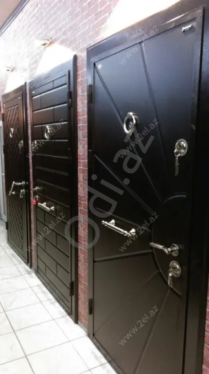 Bina evlərində Çöl Qapılarının iç tərəfinin (Apşifkası) yığılması.