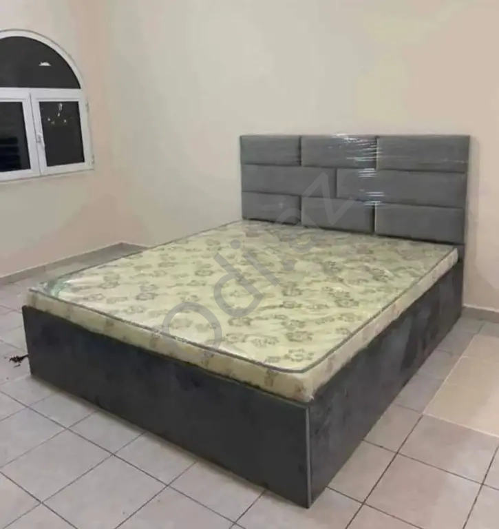 Taxt ikinəfərlik çarpayı