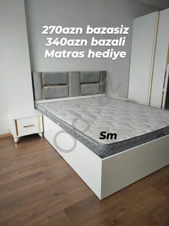 Taxt ikinəfərlik çarpayı