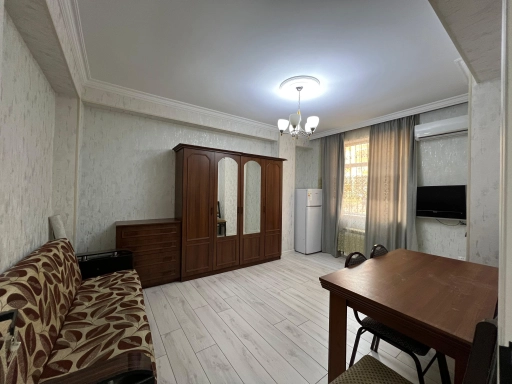 Qurtuluşda kupçalı əşyalı mənzil