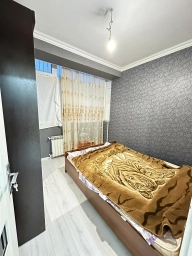 Qurtuluşda kupçalı əşyalı mənzil