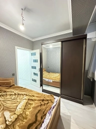 Qurtuluşda kupçalı əşyalı mənzil